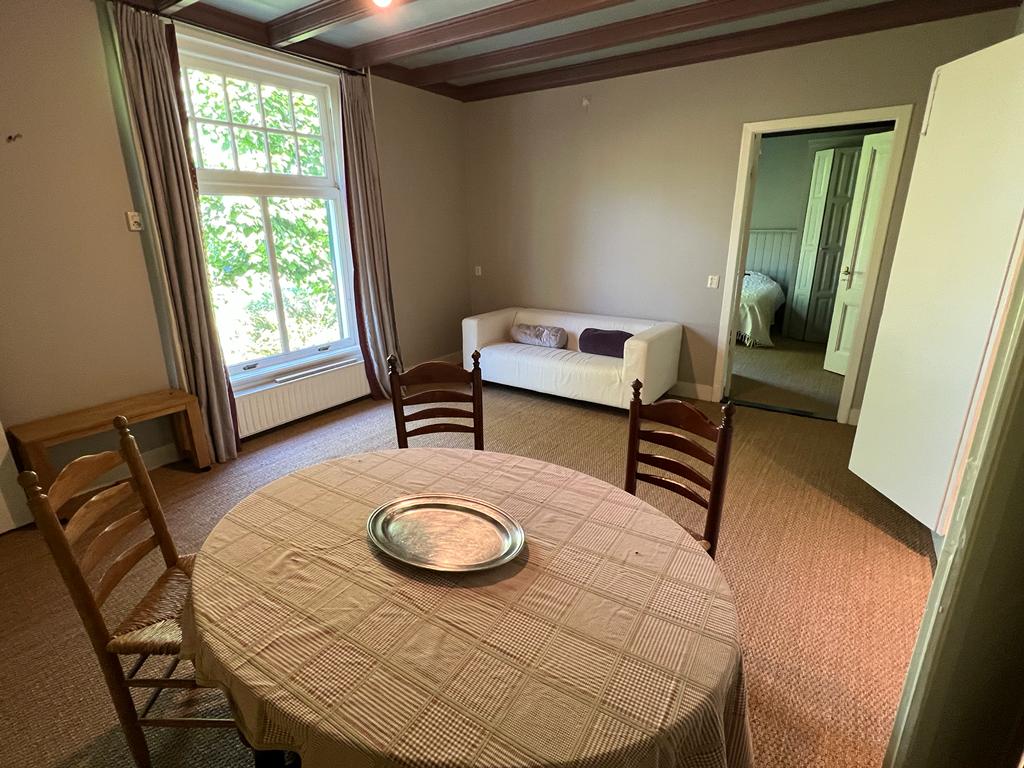 Appartement onder rook van Amsterdam