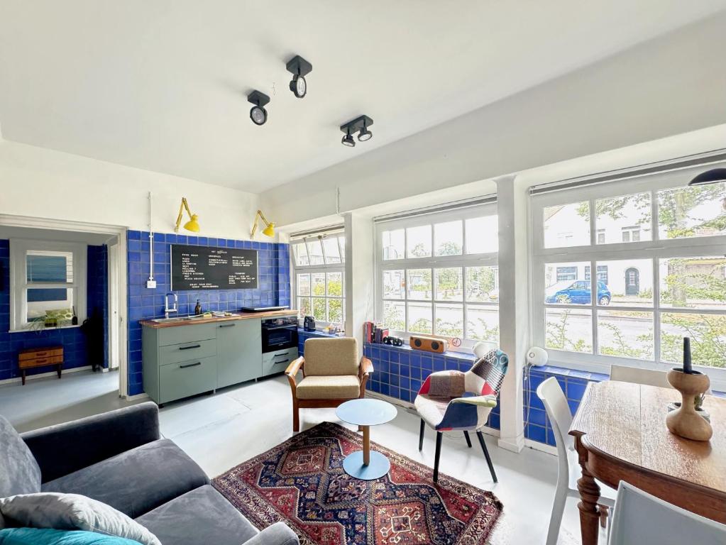 Modern 2-Bedroom Apartment in Converted Bathhouse with Garden in Amsterdam Noord